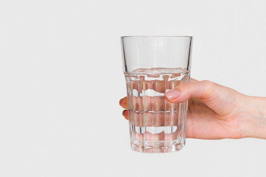 A glass of water with diluted zxcvbnmqwert
